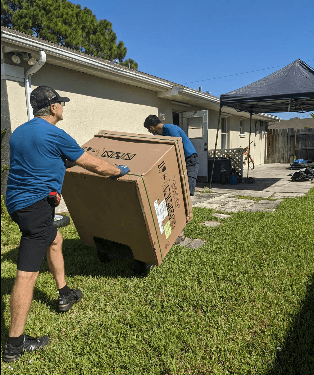Wayne and Colten delivering new unit